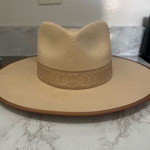 Lack of Colors. Never worn. Used for a hat wall.